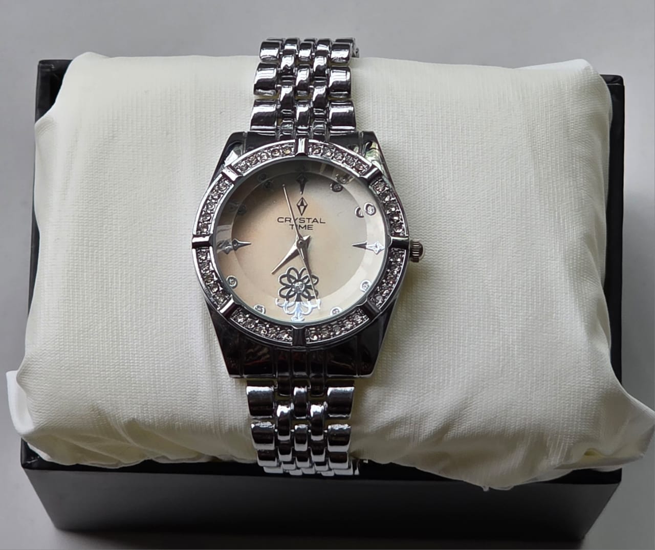 Elegant Silver Crystal Time Watch with Floral Dial & Crystal Bezel