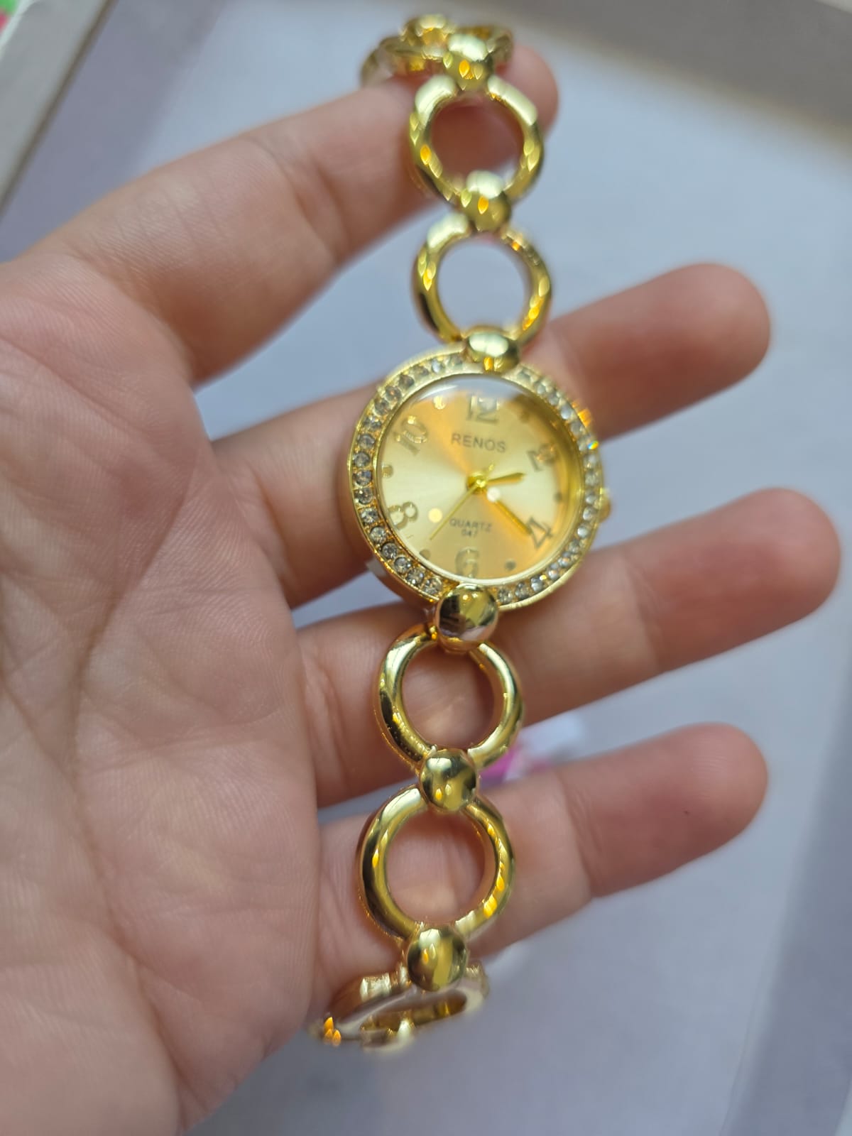 Gold RENOS Elegant Crystal Bracelet Watch - Gold Tone Women's Quartz Timepiece