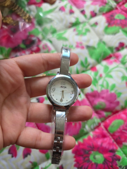 : Elegant Mili Wa Silver Watch with Mother-of-Pearl Dial & Crystal Bezel